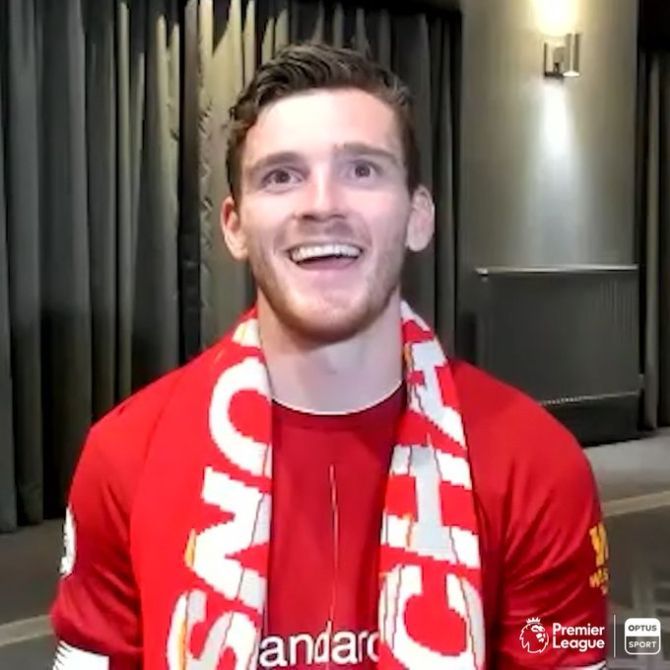 Andy Robertson is all smiles after the win