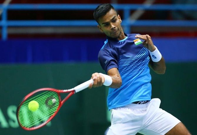 India's Sumit Nagal in action against Croatia's Marin Cilic in the Davis Cup qualifier.