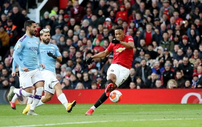 Anthony Martial puts Manchester United ahead in the Premier League match against Manchester City, at Old Trafford, in Manchester, on Sunday