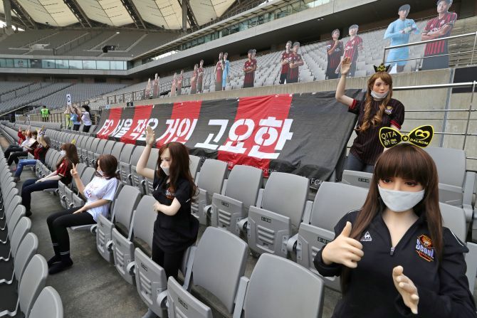 Mannequins are placed in spectator seats to cheer South Korea's football club FC Seoul team during a match against Gwangju FC, which is held without fans due to the coronavirus disease (COVID-19) outbreak, in Seoul, South Korea, on Sunday