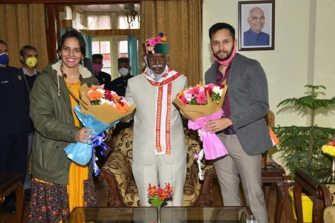 Saina Nehwal and P Kashyap with HP Governor Bandaru Dattatreya