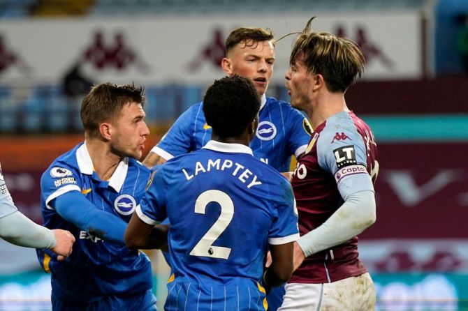 Aston Villa's Jack Grealish clashes with Joel Veltman, Dan Burn and Tariq Lamptey of Brighton and Hove Albion