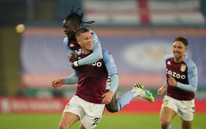 Aston Villa's Ross Barkley celebrates with Bertrand Traore Pool on scoring their first goal at  King Power Stadium, Leicester