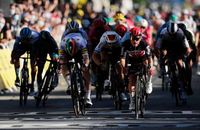 Lotto Soudal rider Australia's Caleb Ewan wins the third stage ahead of Deceuninck-Quick Step's Irish rider Sam Bennett during the Nice to Sisteron stage at the Tour de France on Monday