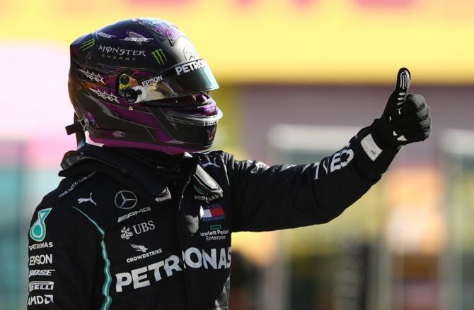 Mercedes' Lewis Hamilton celebrates qualifying in pole position at the Tuscan Grand Prix in  Mugello, Scarperia e San Piero, in Italy on Saturday