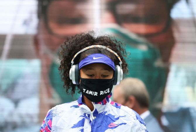 Naomi Osaka walks onto court before the US Open final at the USTA Billie Jean King National Tennis Center in the Queens borough of New York City on Saturday