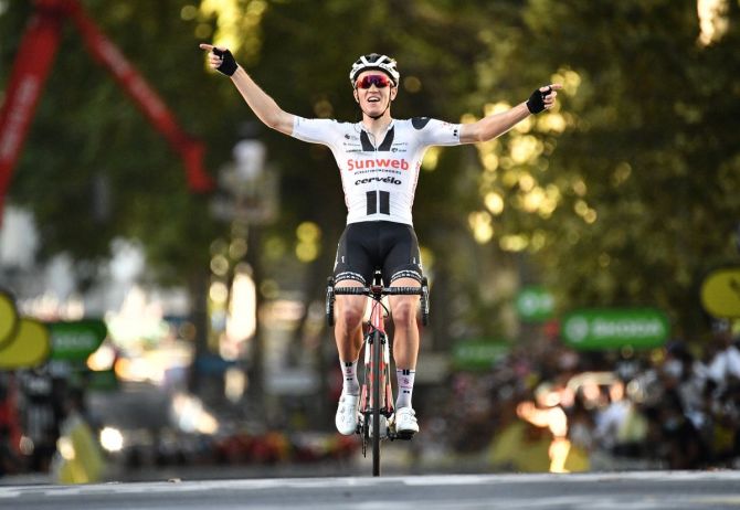 Team Sunweb's Danish rider Soren Kragh Andersen crosses the finish line at Stage 14 -- Clermont-Ferrand to Lyon in France on Saturday