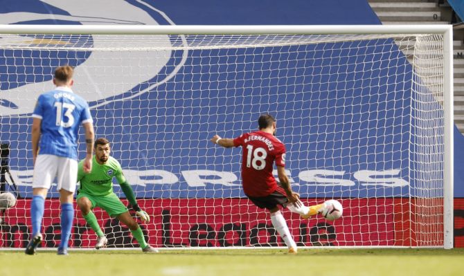 Bruno Fernandes scores from the penalty spot to give Manchester United victory over Brighton & Hove Albion in added time