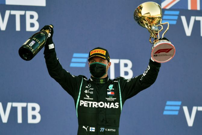 Finland and Mercedes GP's Valtteri Bottas celebrates on the podium after the F1 Grand Prix of Russia