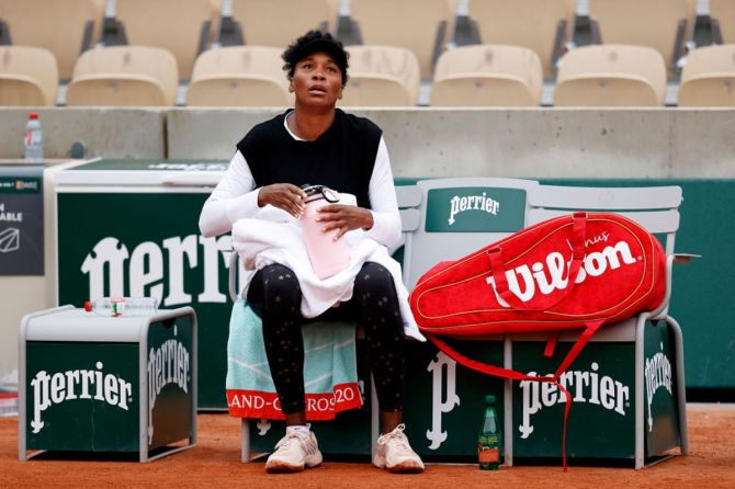 Venus Williams reacts after defeat to Slovakia's Anna Karolina Schmiedlova on Day 1 of the 2020 French Open, at Roland Garros, Paris, on Sunday.