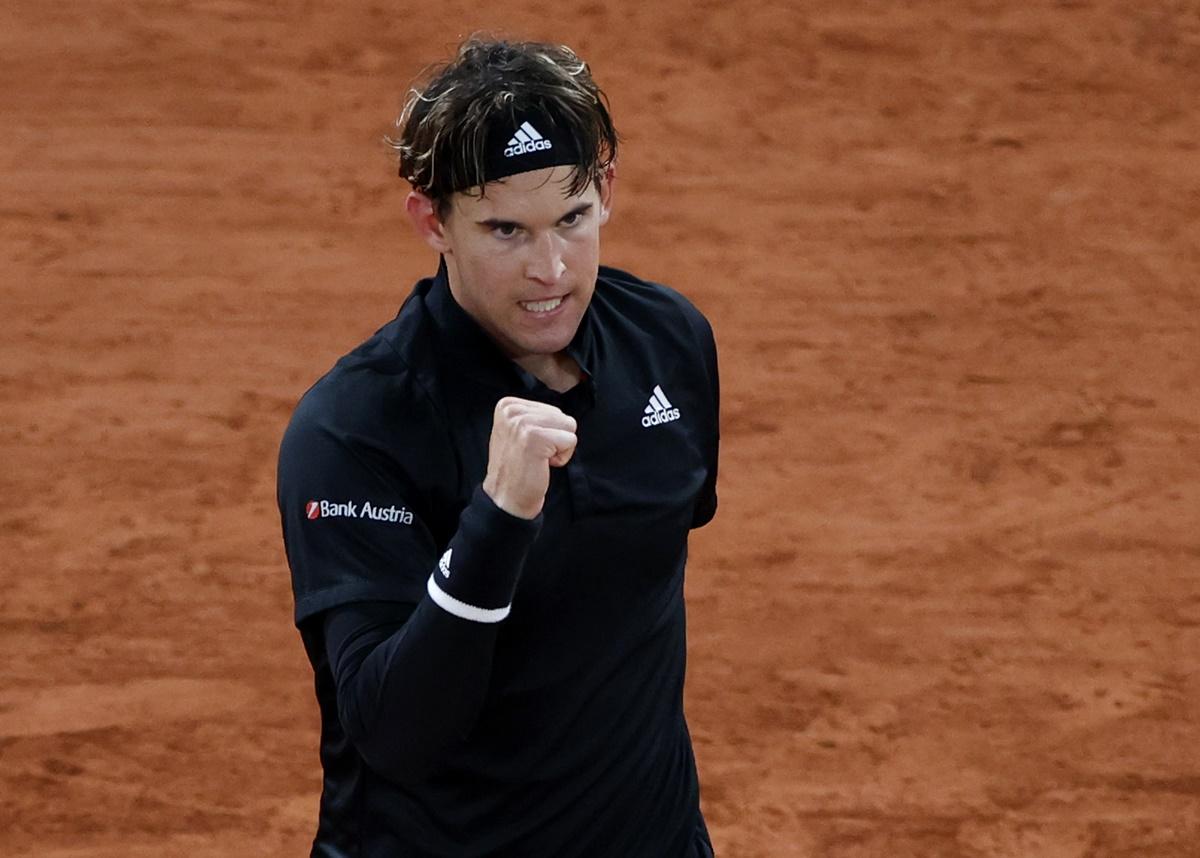 Austria's Dominic Thiem celebrates winning his first round match against Croatia's Marin Cilic.