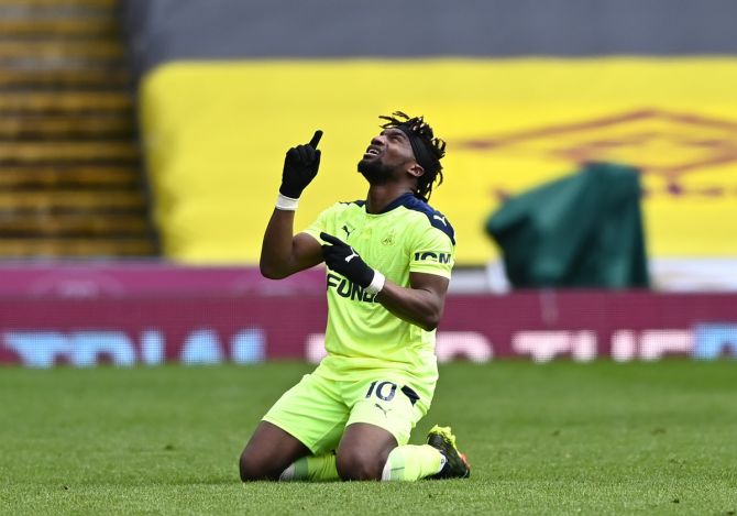 Newcastle United's Allan Saint-Maximin celebrates victory after the Premier League match against Burnley, at Turf Moor in Burnley, England. 