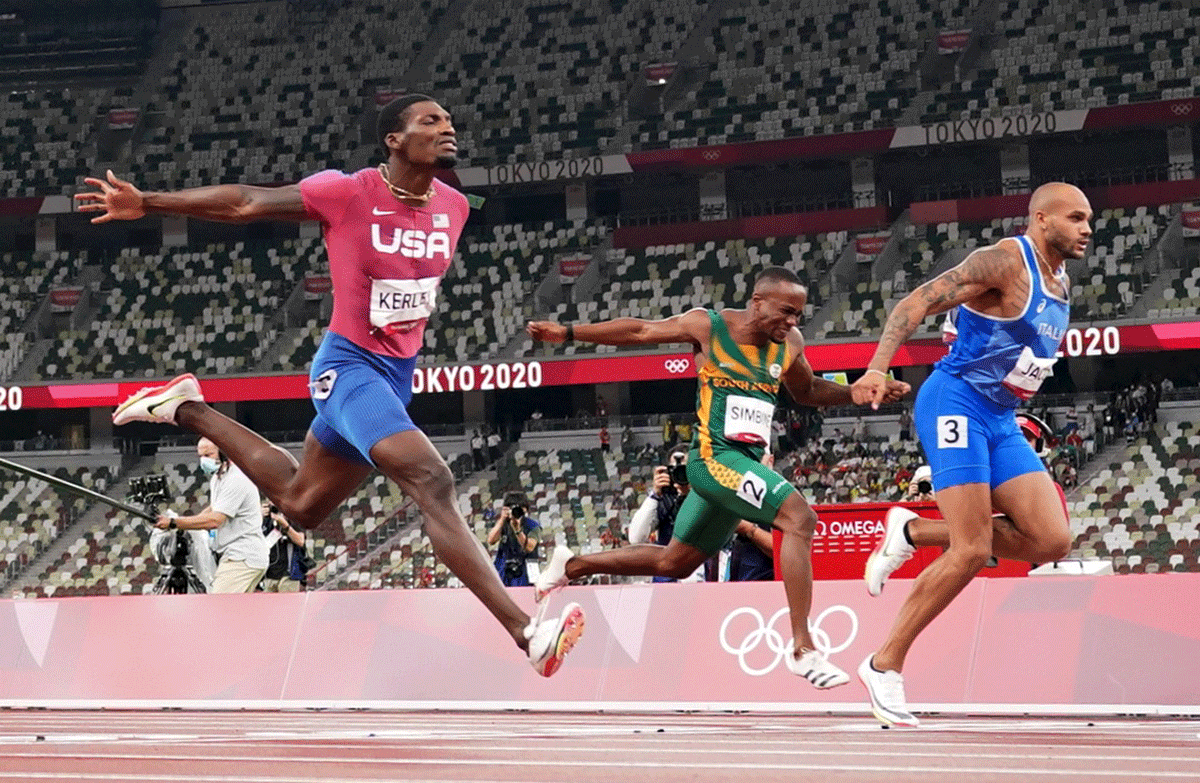 Lamont Marcell Jacobs of Italy, Fred Kerley of the United States and Akani Simbine of South Africa in action during their 100m final at the Olympic Stadium in Tokyo, on Sunday 