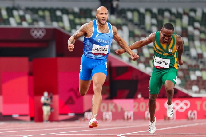 Italy's Lamont Marcell Jacobs wins the men's 100m final on Day 9 of the Olympics, at Olympic stadium in Tokyo, on Sunday.