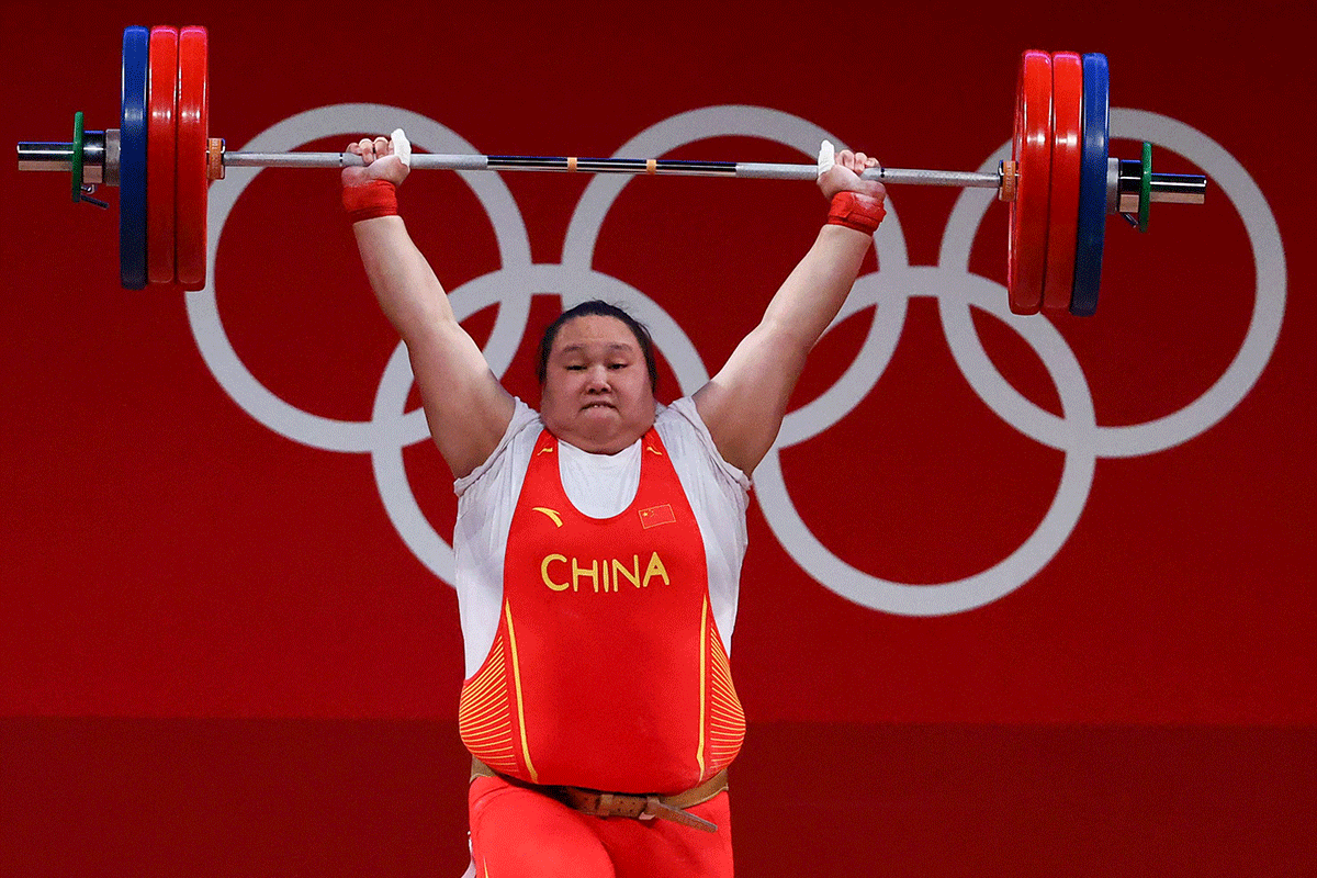 Li Wenwen of China in action during the Women's +87kg Weightlifting event on Tuesday