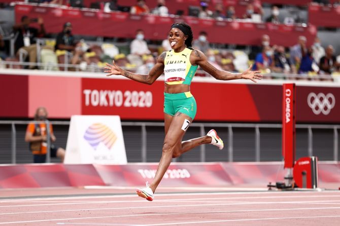 Jamaica's Elaine Thompson-Herah finishes first in the Olympics women's 200 metres final, at Olympic Stadium in Tokyo, on Tuesday. 