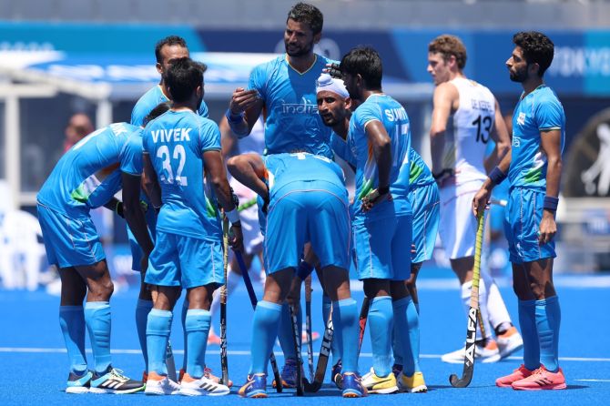 India's players huddle up after scoring against Belgium in the Olympics men's hockey semi-final, at Oi Hockey Stadium in Tokyo, on Tuesday.