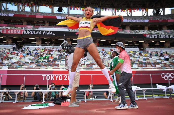 Germany's Malaika Mihambo celebrates winning the gold medal in the Olympics women's Long Jump final.