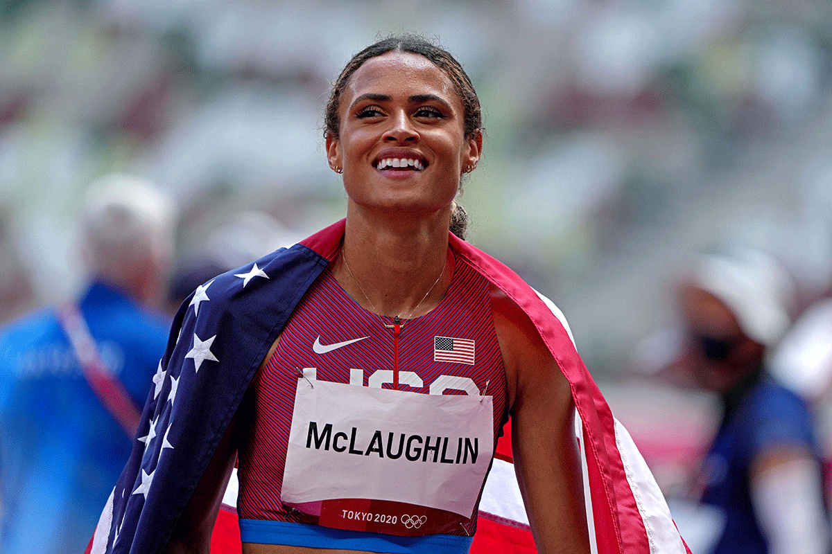 Sydney McLaughlin (USA) celebrates winning the gold medal in the women's 400m hurdles final in a world record time during the Tokyo 2020 Olympic Summer Games at Olympic Stadium on Wednesday