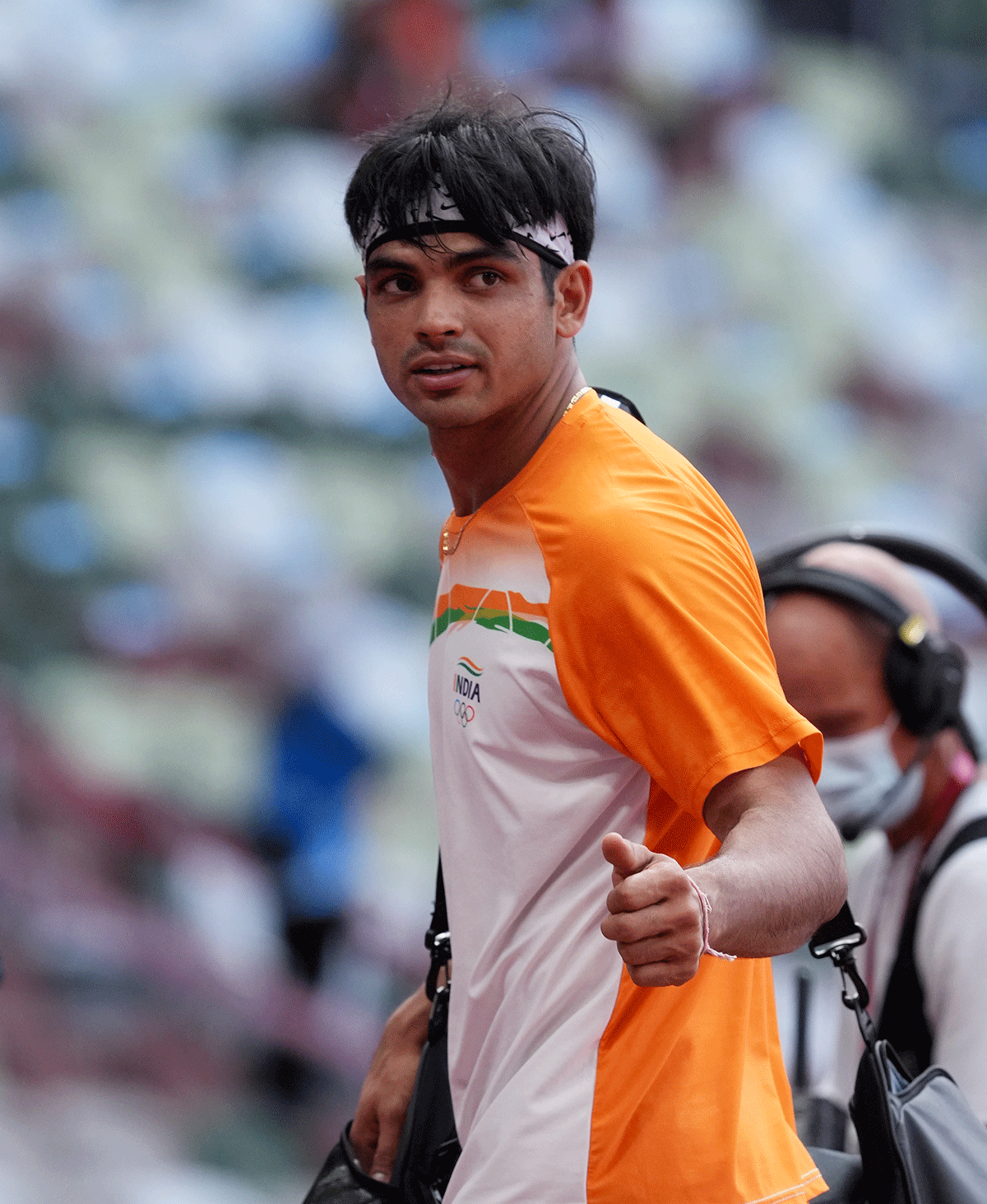 India's Neeraj Chopra leaves the arena after qualifying for the Olympics men's Javelin Throw final, in Tokyo, on Wednesday. 