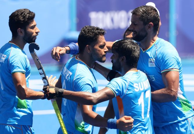 Harmanpreet Singh celebrates scoring India's third goal with teammates during the Olympics men's hockey bronze medal match against Germany, at Oi Hockey Stadium in Tokyo, on Thursday.