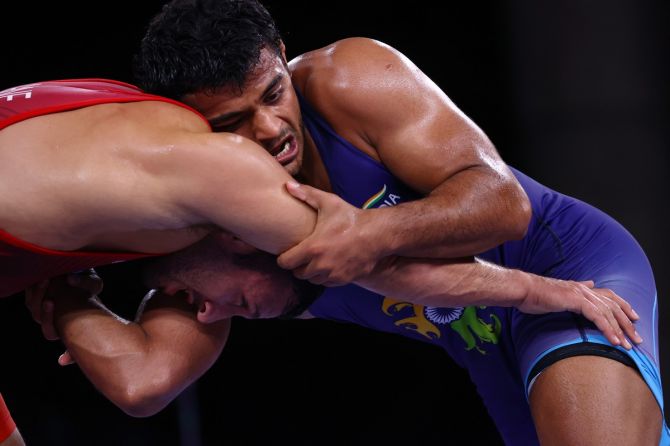 India's Deepak Punia in action against San Marino's Myles Nazem Amine during the Olympics men's 86kg Freestyle wrestling bronze medal match