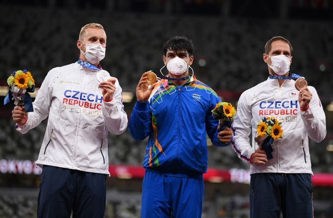 (L-R) Silver medalist Jakub Vadlejch of the Czech Republic, gold medalist Neeraj Chopra of India and bronze medalist Vitezslav Vesely of the Czech Republic on the podium.