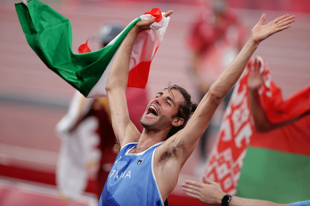 Gianmarco Tamberi of Italy celebrates after winning Men's High Jump at the gold at the Tokyo Olympics on August 1