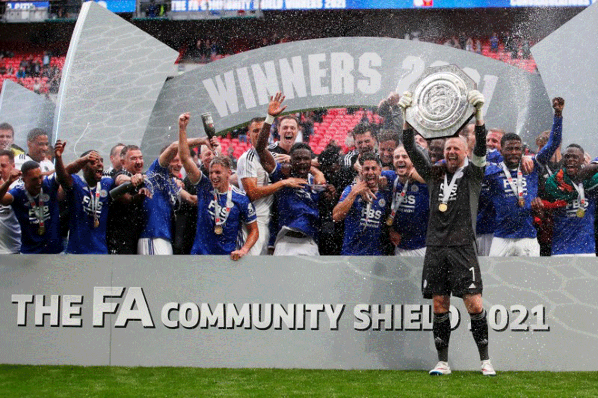 Leicester City's Kasper Schmeichel and teammates celebrate with the trophy after winning the FA Community Shield at Wembley Stadium on Saturday