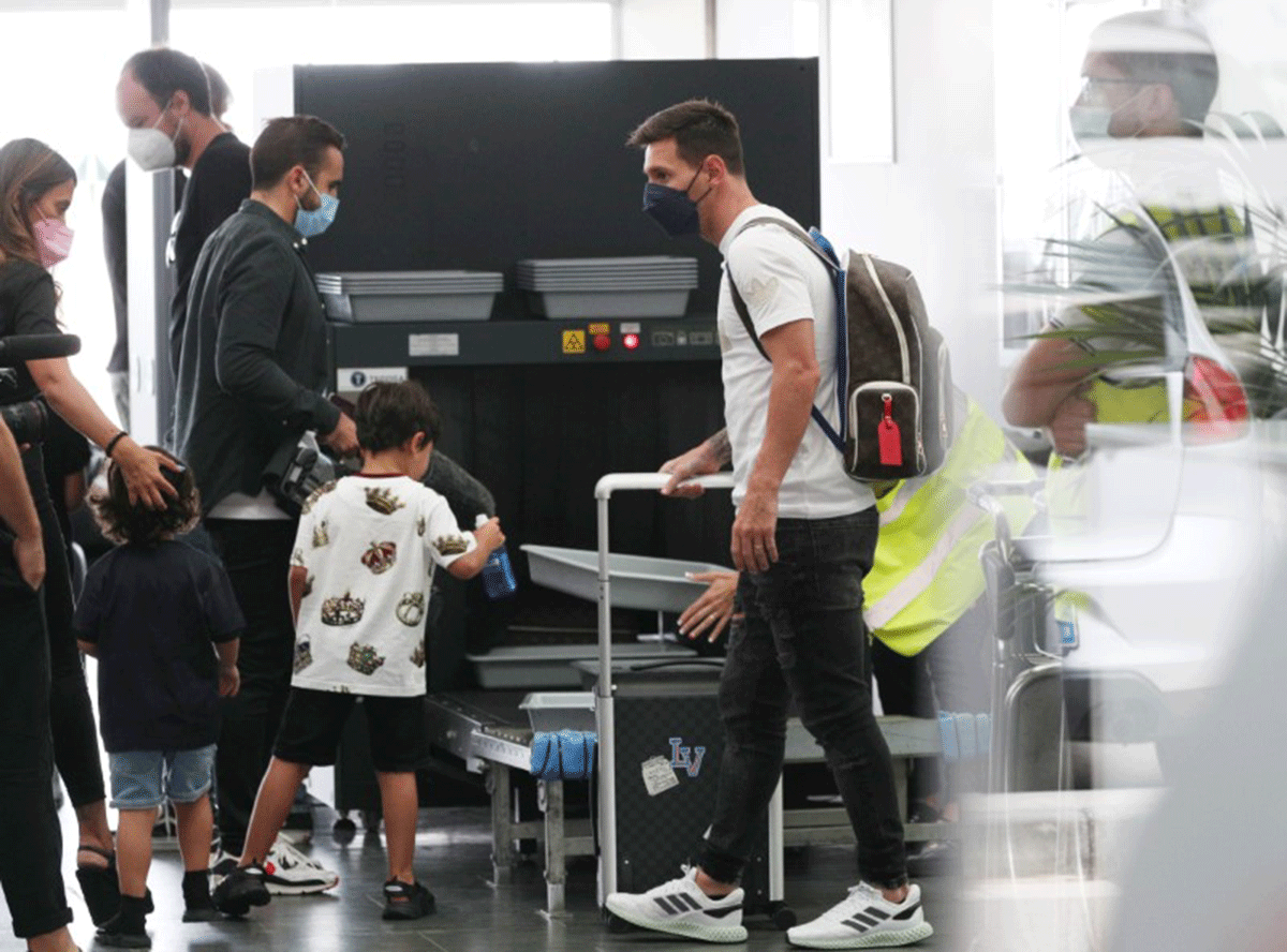 Lionel Messi is seen with his wife Antonela and their children at Josep Tarradellas Barcelona-El Prat Airport in Barcelona, before flying to Paris on Tuesday 