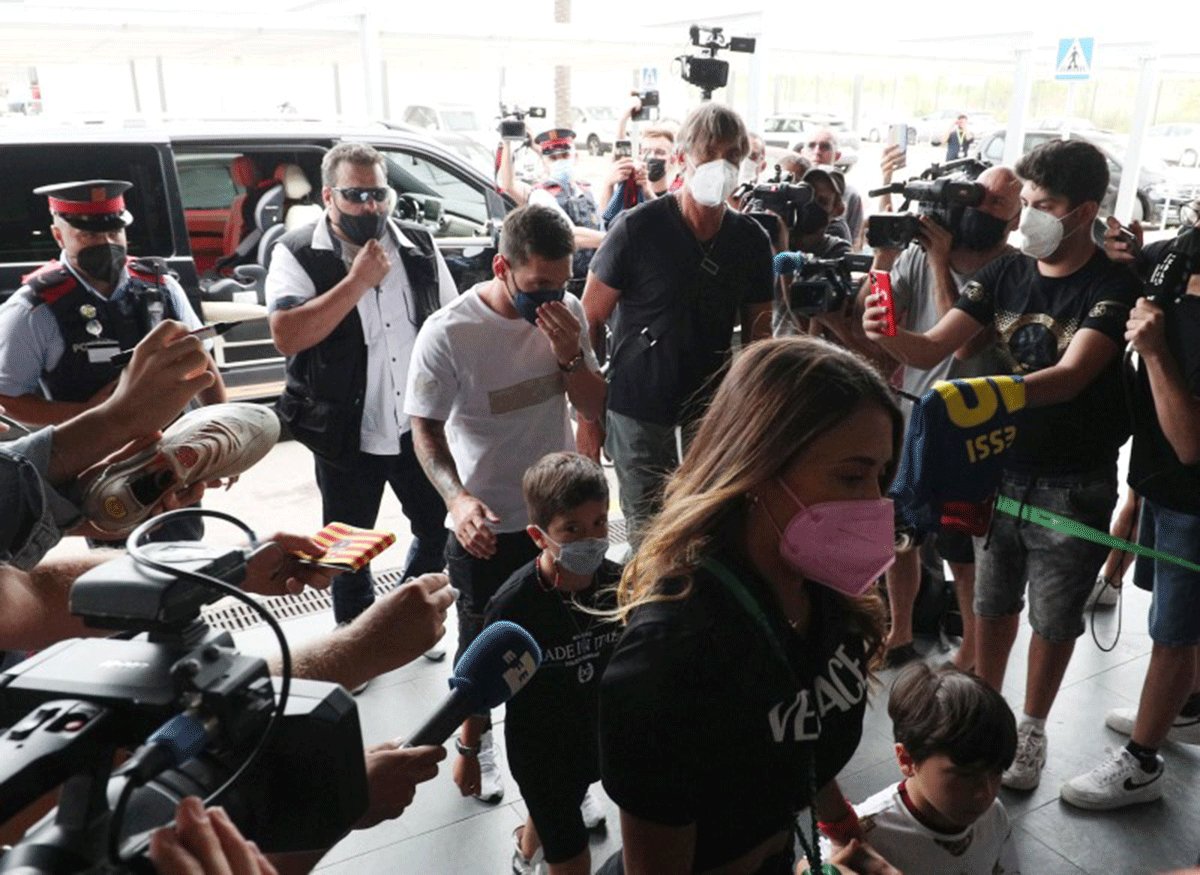 Lionel Messi arrives with his wife Antonela and their children at Josep Tarradellas Barcelona-El Prat Airport in Barcelona on Tuesday