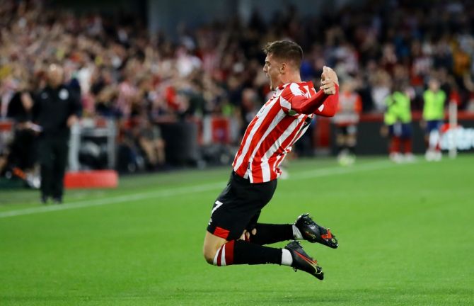 Sergi Canos celebrates scoring Brentford's first goal in the Premier League match against Arsenal, at Brentford Community Stadium, London, on Friday.