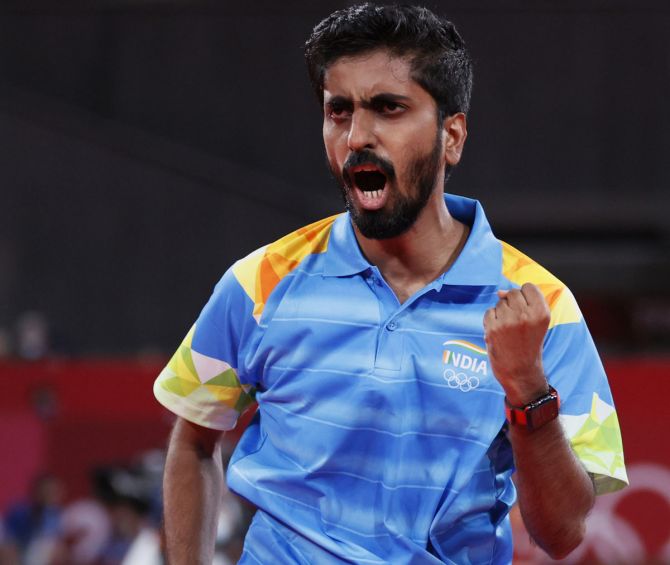 India's Sathiyan Gnanasekaran reacts during his men's singles Round 2 match at the Tokyo Olympics on July 25, 2021. 