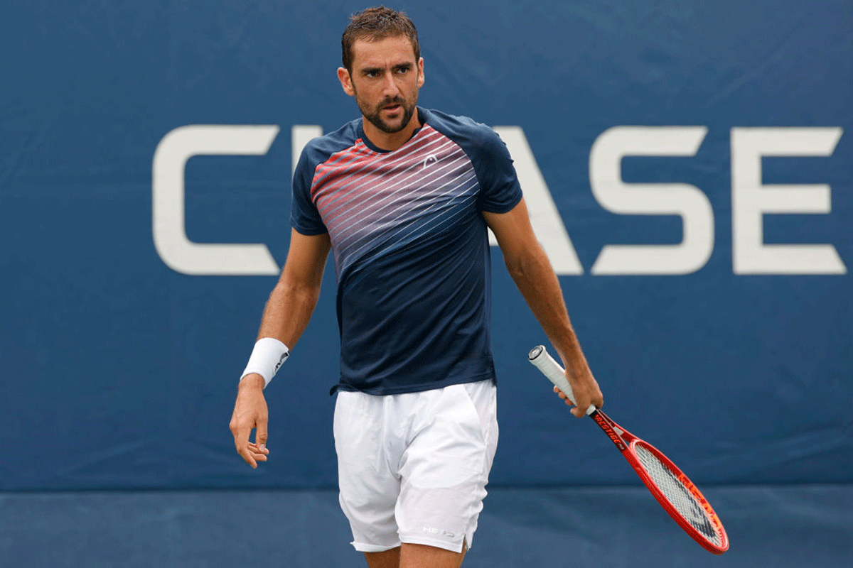 Croatia's Marin Cilic reacts during his match against Germany's Philipp Kohlschreiber