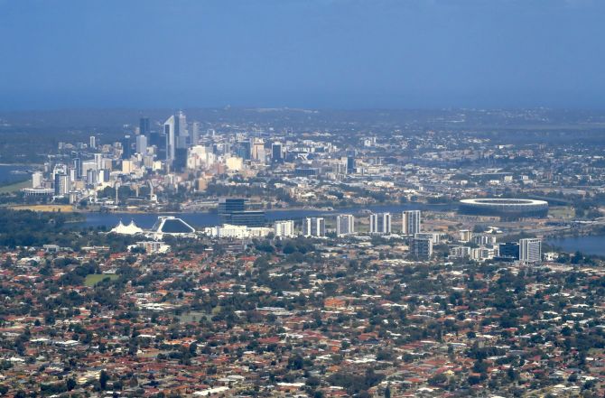 The newly completed Perth Stadium can be seen near the Crown Casino and central business district (CBD) of Perth in Australia.