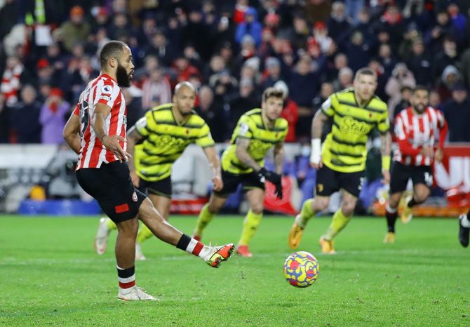 Bryan Mbeumo scores Brentford's second goal from the penalty spot during the Premier League match against Watford, at Brentford Community Stadium, London, on Friday.