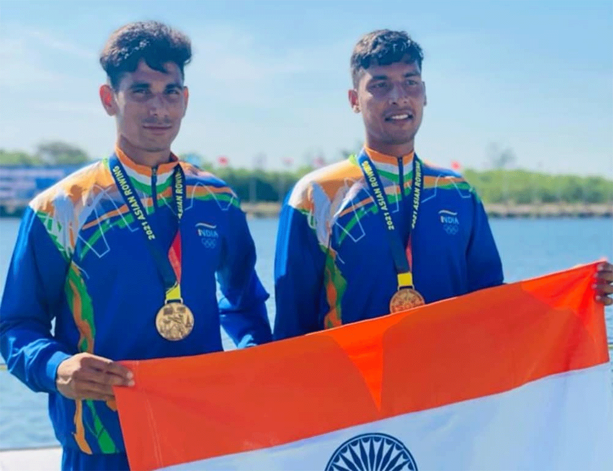 Indian rowers Arjun Lal Jat and Ravi with their gold medals at the Asian Rowing Championships in Bangkok on Saturday