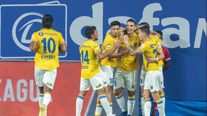 Jorge Pereyra Diaz celebrates with teammates after putting Kerala Blasters ahead in the Indian Super League match against Chennaiyin FC, in Vasco, Goa, on Wednesday.
