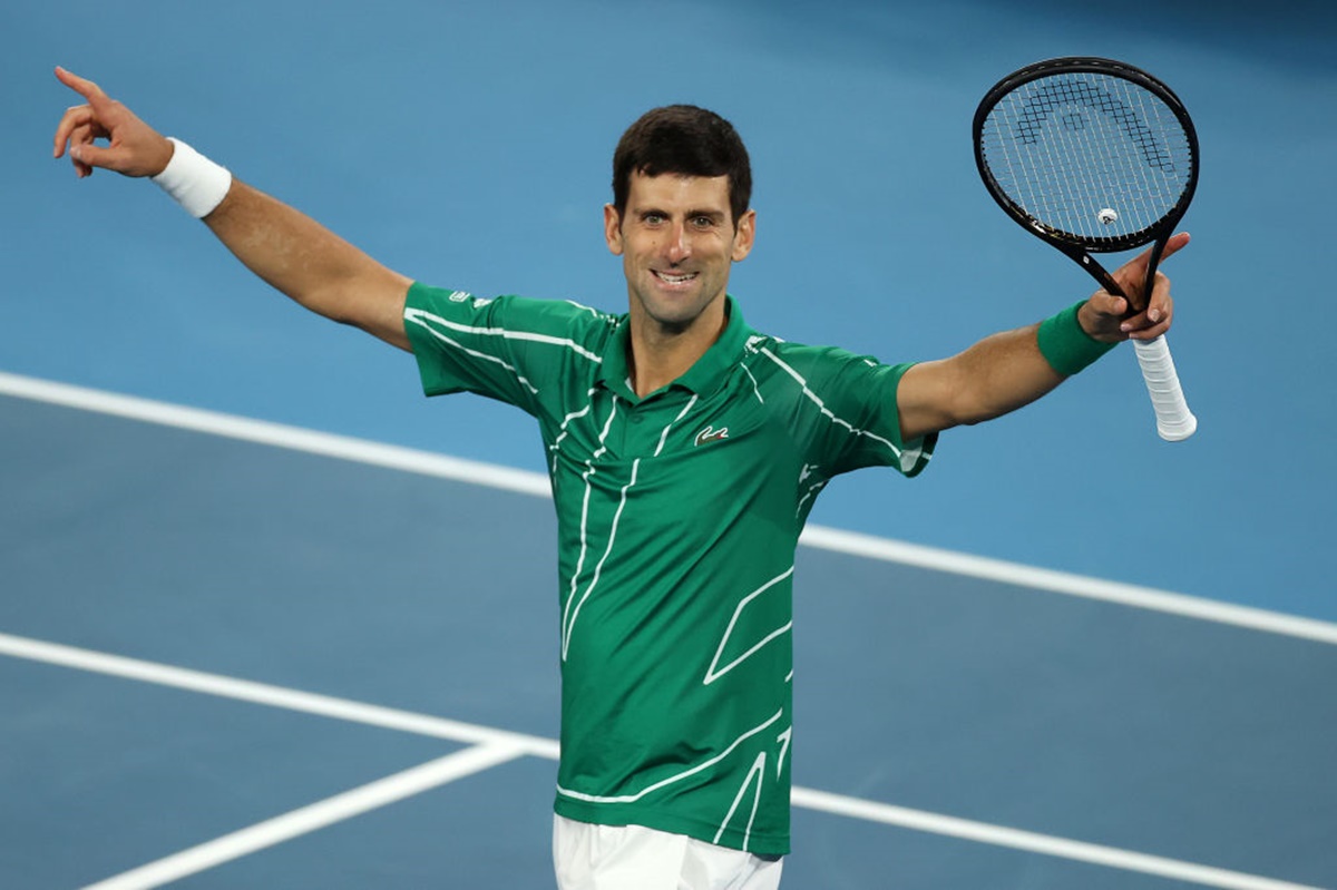 Serbia's Novak Djokovic celebrates beating Austria's Dominic Thiem in the men's singles final of the 2020 Australian Open, at Melbourne Park, on February 2, 2020. 