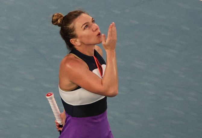 Simona Halep celebrates after her first round win.