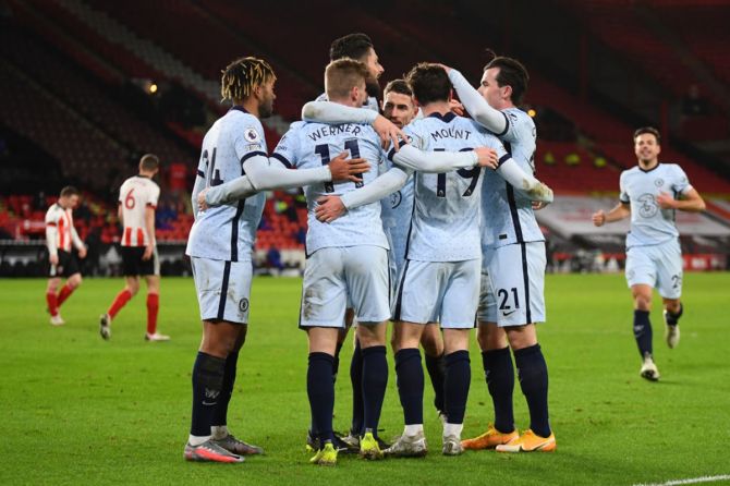 Mason Mount is congratulated by his Chelsea teammates after scoring the opening goal during the Premier League match against Sheffield United.