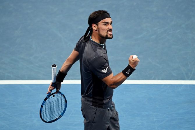 Fabio Fognini celebrates after winning a point during his second round match against Salvatore Caruso.