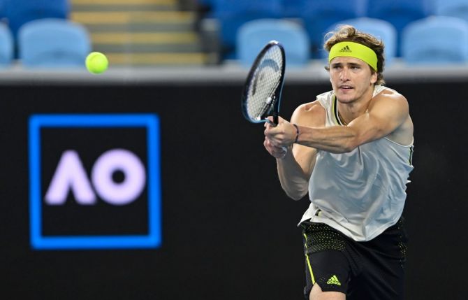 Germany's Alexander Zverev plays a return against Serbia's Dusan Lajovic during their fourth round match 
