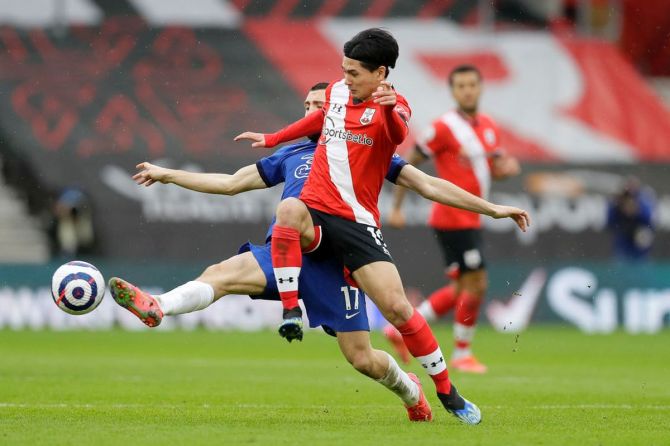 Chelsea's Mateo Kovacic battles for possession with Southampton's Takumi Minamino during their Premier League match at St Mary's Stadium in Southampton on Saturday