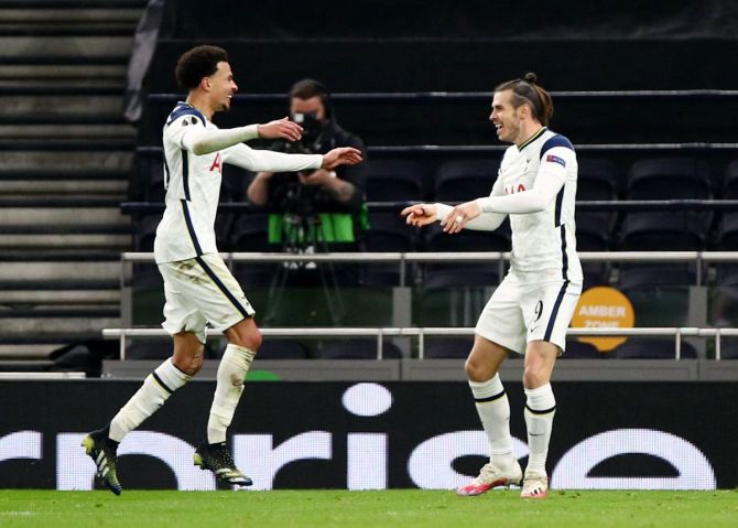 Tottenham Hotspur's Gareth Bale celebrates with Dele Alli after scoring their third goal against Wolfsberger AC at Tottenham Hotspur Stadium in London on Wednesday.