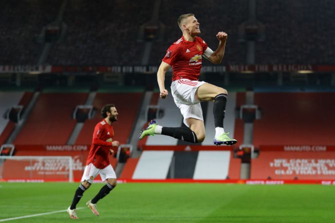 Scott McTominay celebrates after scoring for Manchester United during the FA Cup third round match against Watford, at Old Trafford on Saturday.
