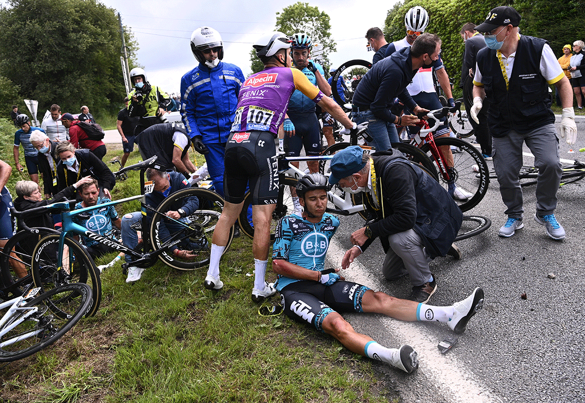 B&B Hotels p/b KTM rider Cyril Lemoine of France receives medical attention after crashing on Brest to Landerneau at the Tour de France. 