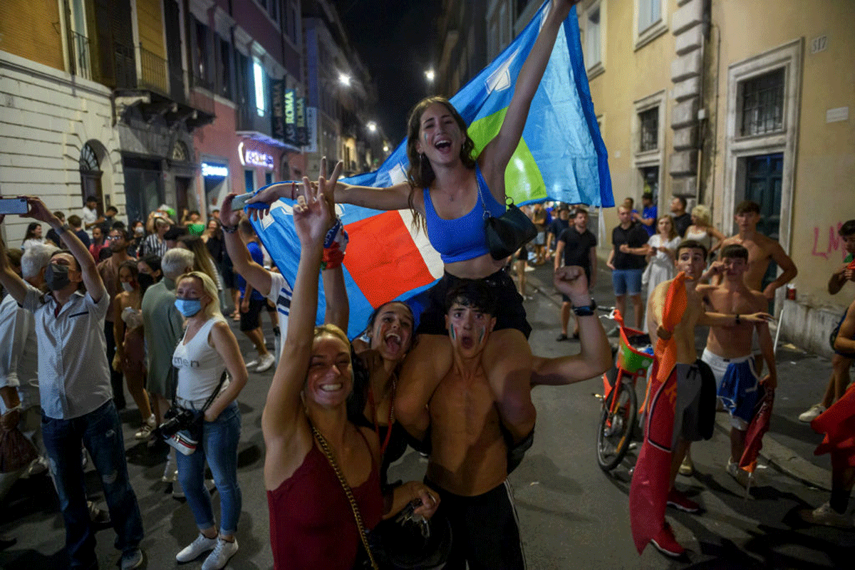Italian fans celebrate their football team's Euro 2020 victory in Rome on Monday, July 12.
