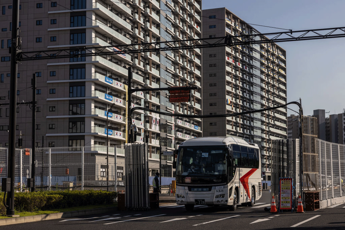 A bus leaves the Tokyo Olympics athletes village on Monday.
