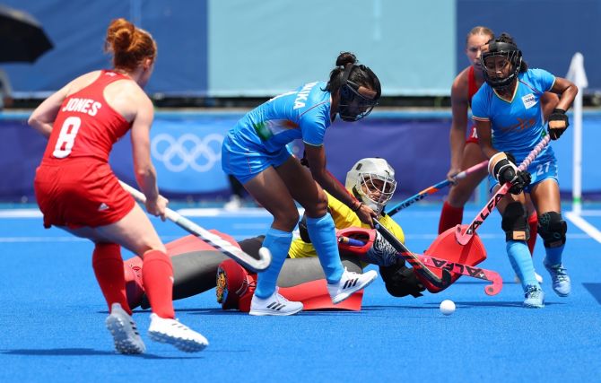 Goalkeeper Savita Punia effects a fine stop as India defend a penalty-corner in their Olympics women's hockey match against Great Britain, at Oi Hockey stadium, in Tokyo, on Wednesday.